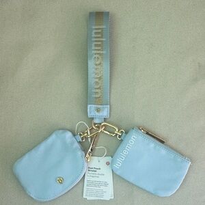 lululemon athletica Light Blue Dual Pouch Wristlet with Gold Hardware